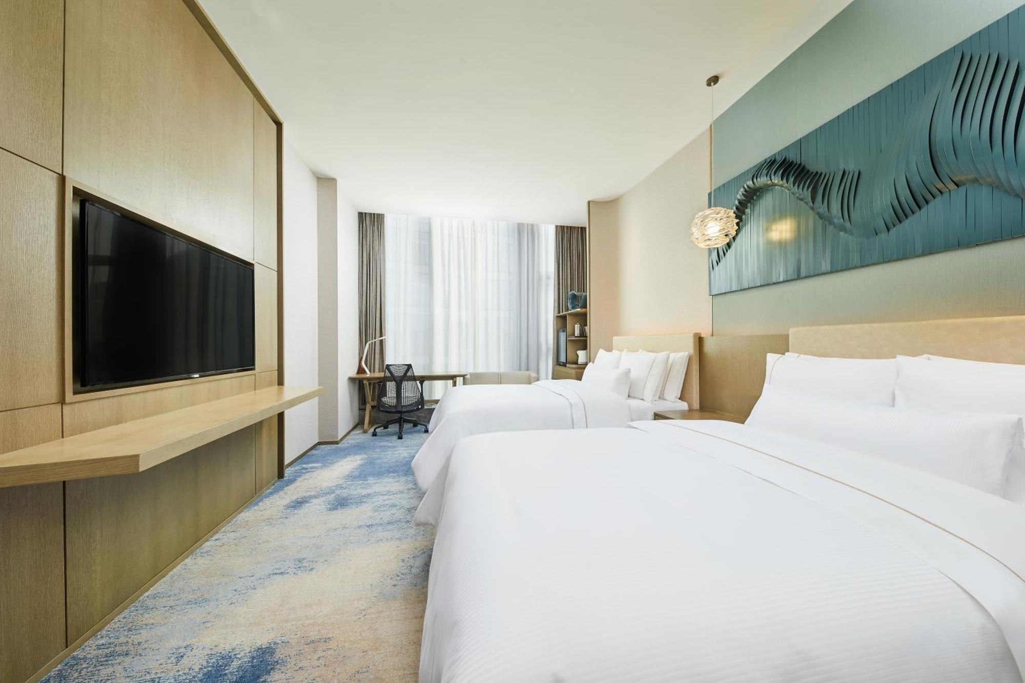 Hotel The Westin Qingdao West Coast Exterior foto
